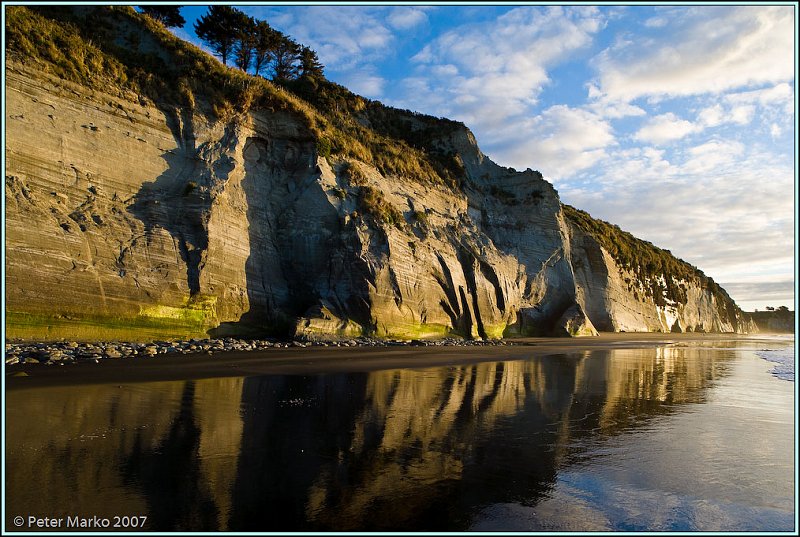 WV8X3151.jpg - White Cliffs reflection in the wet sand, Taranaki, New Zealand