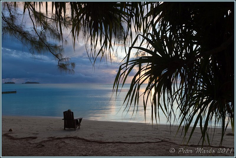 IMG_9165.jpg - Watching sunset over Aitutaki Lagoon from the beach on Akaiami island.