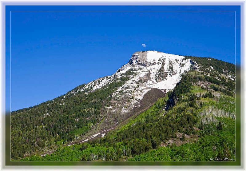 IMG_4450.jpg - Rising Moon above Rocky Mountains in Marble, Colorado, USA in late spring.